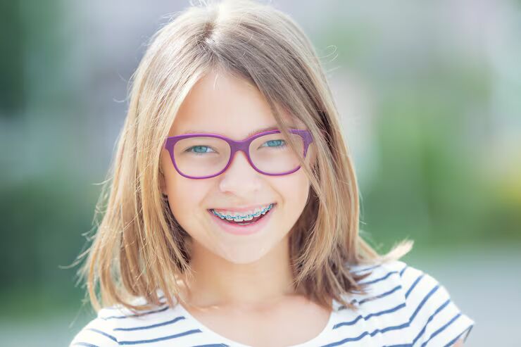 child with orthodontic braces